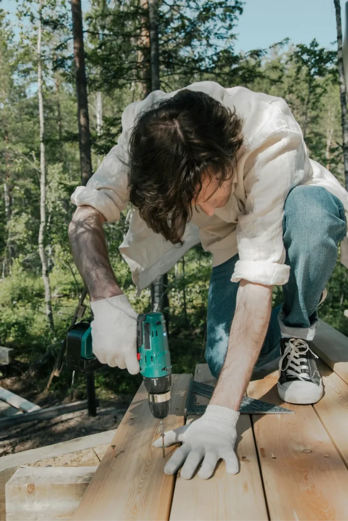 A man building a deck